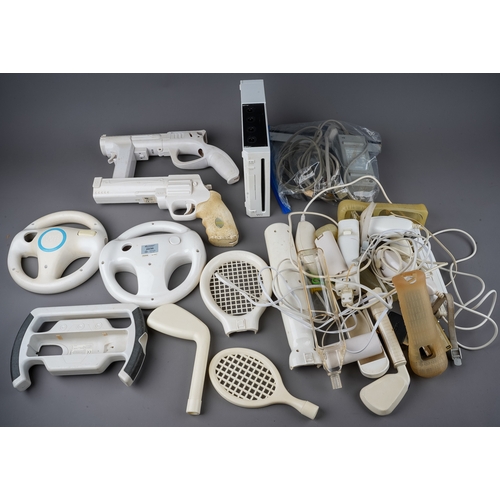 266 - A Nintendo Wii games console, various controllers, accessories and 35 assorted boxed / cased games t... 