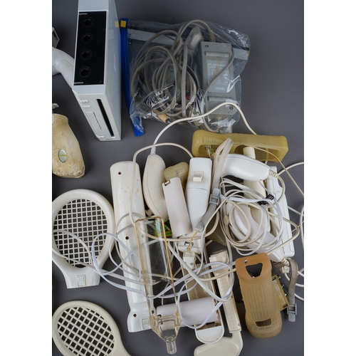 266 - A Nintendo Wii games console, various controllers, accessories and 35 assorted boxed / cased games t... 