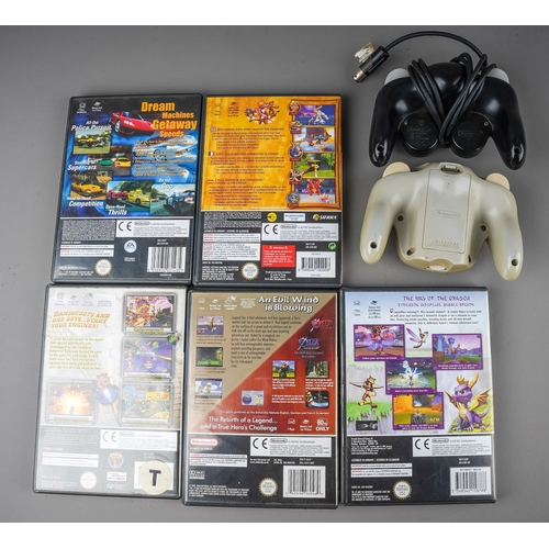 269 - Two Nintendo Game Cube controlers together with five assorted boxed games to include: The Legend of ... 