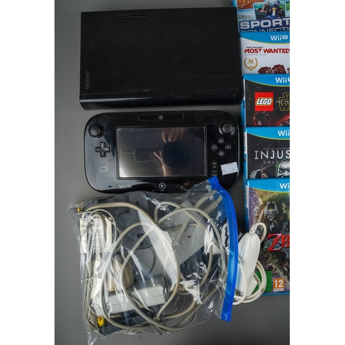 271 - Nintendo Wii U game pad, console, power cables and collection of twenty one assorted boxed / cased W... 