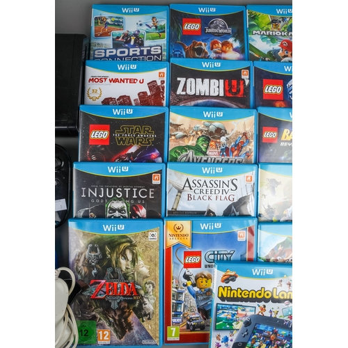 271 - Nintendo Wii U game pad, console, power cables and collection of twenty one assorted boxed / cased W... 