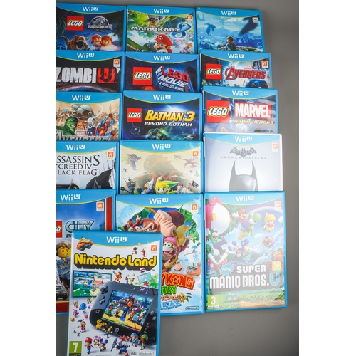 271 - Nintendo Wii U game pad, console, power cables and collection of twenty one assorted boxed / cased W... 