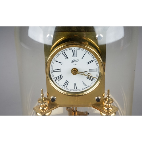 277 - A Modern Schatz brass anniversary clock, white dial with Roman Numerals, the reverse numbered 0837 w... 