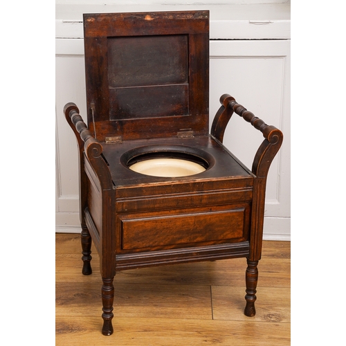 291 - A 19th Century mahogany commode, hinged cover opens to reveal ceramic pot, with turned handles and s... 