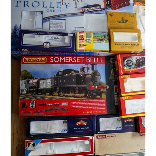 297 - Two boxes of assorted model railway kit buildings to include: houses, factories, stations, bridges, ... 