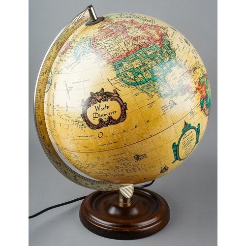 306 - A very large terracotta bottle lamp; together with a lamp designed as a globe (2)