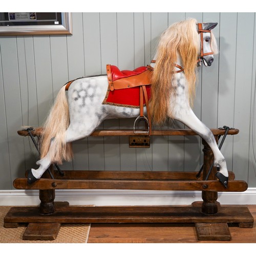 315 - An early 20th Century dapple grey rocking horse in the style of a Lines Brothers 