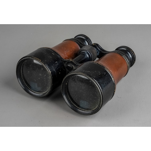 316 - A pair of vintage binoculars, with fitted leather case