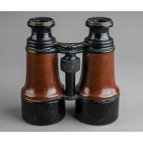 316 - A pair of vintage binoculars, with fitted leather case