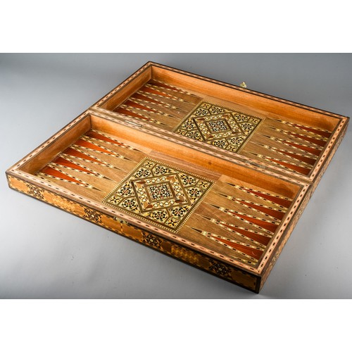 324 - A Continental inlaid backgammon / games board, approx 49 x 25cm