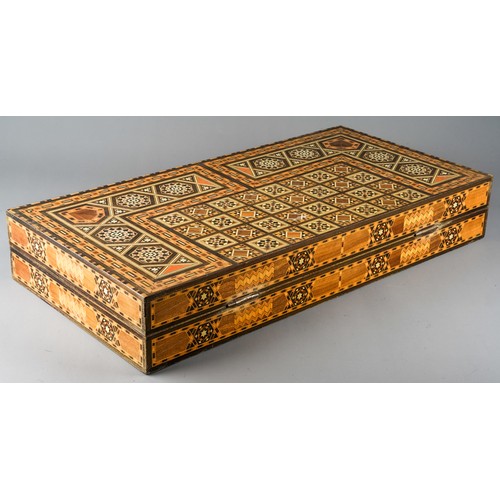 324 - A Continental inlaid backgammon / games board, approx 49 x 25cm