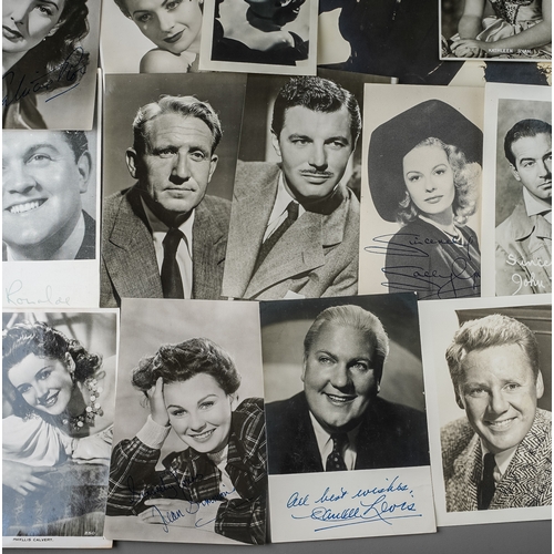 335 - Autographs: a signed 1943 black and white image of Joan Crawford, signed in blue ballpoint top left ... 