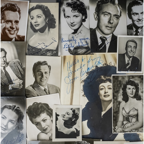 335 - Autographs: a signed 1943 black and white image of Joan Crawford, signed in blue ballpoint top left ... 