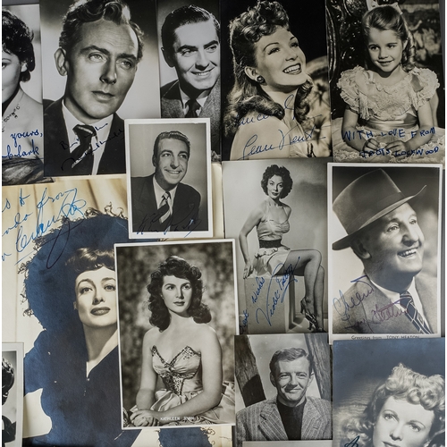 335 - Autographs: a signed 1943 black and white image of Joan Crawford, signed in blue ballpoint top left ... 