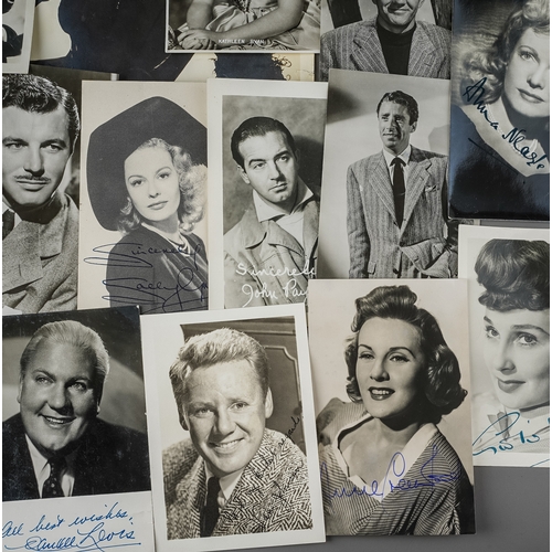 335 - Autographs: a signed 1943 black and white image of Joan Crawford, signed in blue ballpoint top left ... 