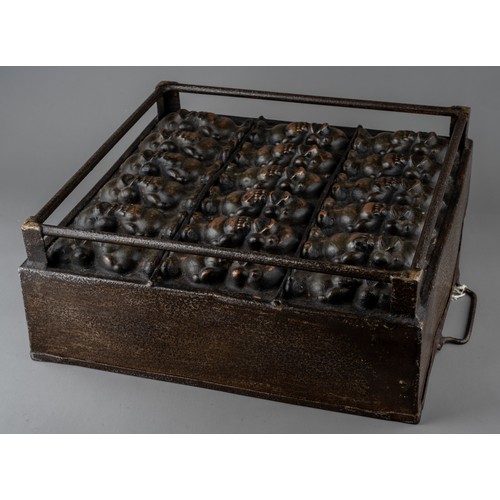 337 - A Victorian wrought iron  and copper chocolate mould, to make duckling shaped hollow chocolates.

Ap... 