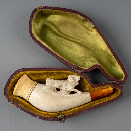 355 - A Meerschaum crouching spaniel pipe, in fitted leather case, approx 8cm long