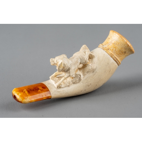 355 - A Meerschaum crouching spaniel pipe, in fitted leather case, approx 8cm long