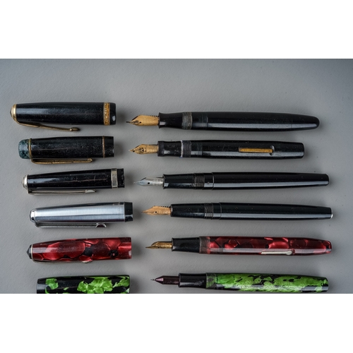 356 - A collection of vintage fountain pens including Parker, Schaeffer and others, four with 14k nibs (Q)