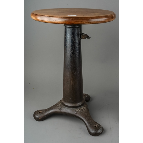 362 - Two Singer stools with cast iron bases, revolving seats (2)