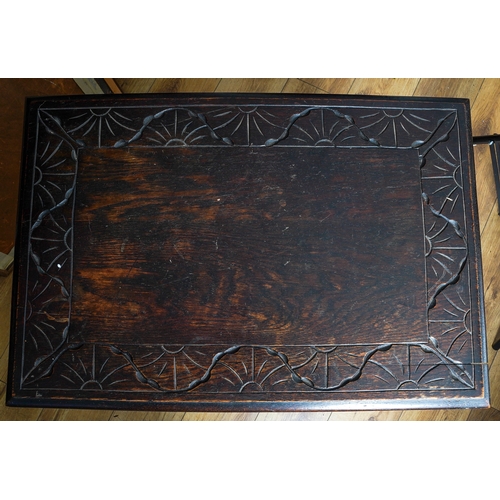 385 - A 17th Century style painted oak side table, the rectangular top with incised sunbeam decoration on ... 