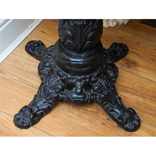 386 - A Victorian style large circular occasional table with cast iron base and modern wooden top (1)