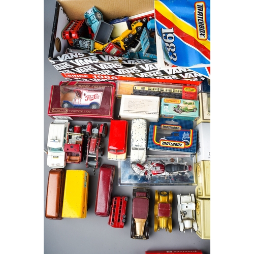 387 - A collection of boxed and loose die cast models of cars, vans, trucks, makers to include: Dinky Matc... 