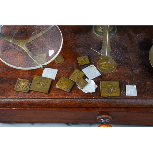 394 - A W&T Avery set of scales on mahogany, with weights and glass scales to interior, approx 26 x 13cm