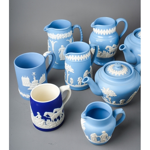 404 - A collection of Modern Wedgwood style Jasparware mainly blue including teapots, jugs and coffee pots... 