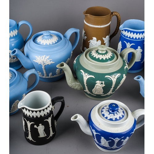 404 - A collection of Modern Wedgwood style Jasparware mainly blue including teapots, jugs and coffee pots... 