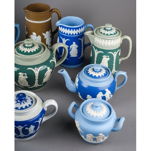 404 - A collection of Modern Wedgwood style Jasparware mainly blue including teapots, jugs and coffee pots... 