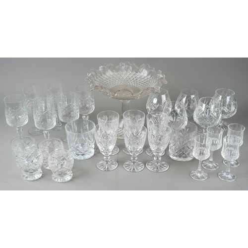 407 - A collection of glassware to include decanters, candlesticks, blue glass brandy glass, cruet set wit... 