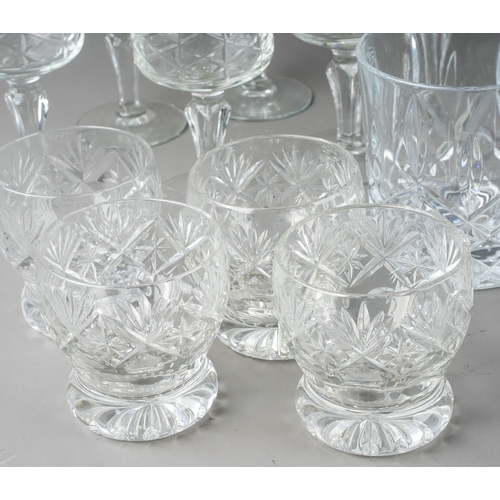 407 - A collection of glassware to include decanters, candlesticks, blue glass brandy glass, cruet set wit... 