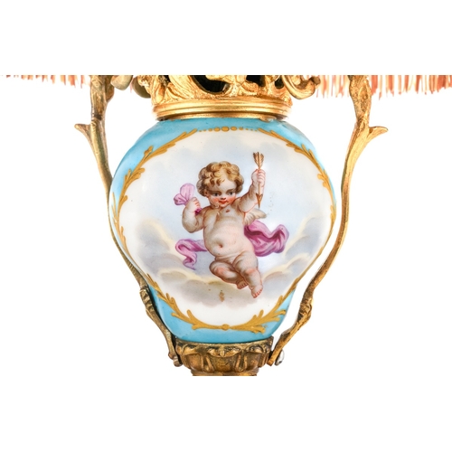 427 - Sevres porcelain and gilt bronze mounted table lamp with original silk shade. Decorated with hand pa... 