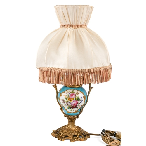 427 - Sevres porcelain and gilt bronze mounted table lamp with original silk shade. Decorated with hand pa... 