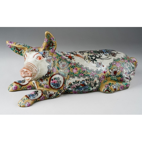 432 - A Japanese porcelain pig, the body decorated with vignettes depicting vase of flowers and birds, the... 