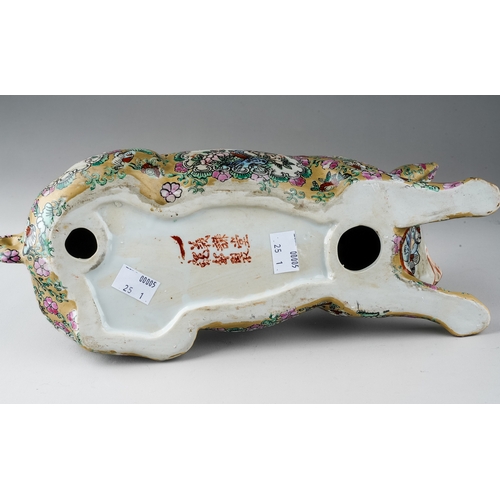 432 - A Japanese porcelain pig, the body decorated with vignettes depicting vase of flowers and birds, the... 