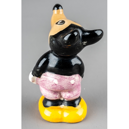 441 - A 1930s ceramic figure of Mickey Mouse, grey shorts with yellow shoes, stamped W.F, ENG to base, app... 