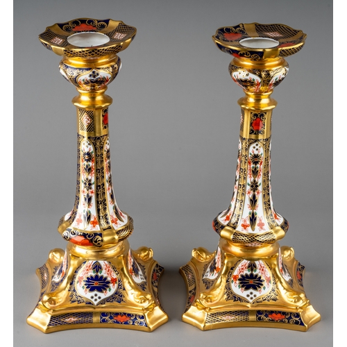 445 - A pair of Royal Crown Derby Imari 1128 large candlesticks, red backstamps, date code for 1979, 26.5c... 