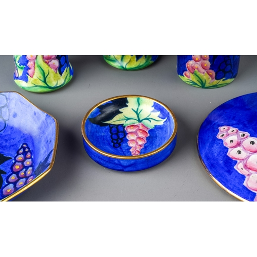 453 - A collection of very rare Carlton Ware 1928 'New Delphinium' pattern, to include candle holder, appr... 