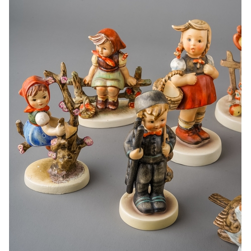 493 - Twelve various German figures of children and a robin, eleven Hummel and one by Friedal (12)