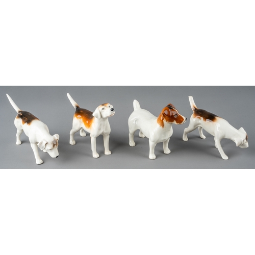 495 - Four Beswick dogs to include three Hounds and a Jack Russell (4)