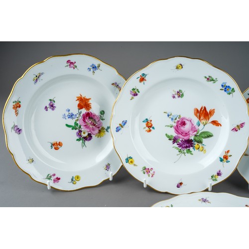 499 - A set of five early 20th Century Meissen side plates, decorated with insects and floral bouquets and... 