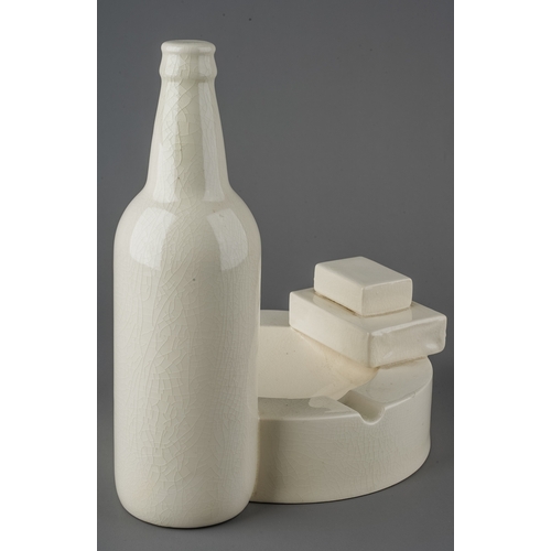 511 - Robin Levien - novelty cream ware pottery in the form of an ash tray, a bottle of beer, a cigarette ... 