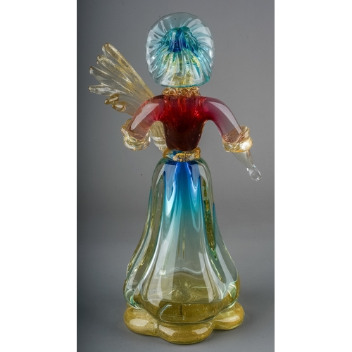 517 - A Murano glass figure of a lady wearing bonnet and carrying bread, in clear with gold powders and bl... 