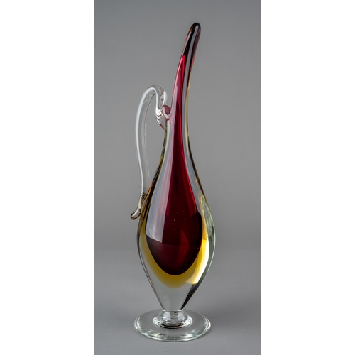 526 - A 20th Century Murano glass purple and amber Sommerso carafe jug in the manner of Flavio Poli, appro... 