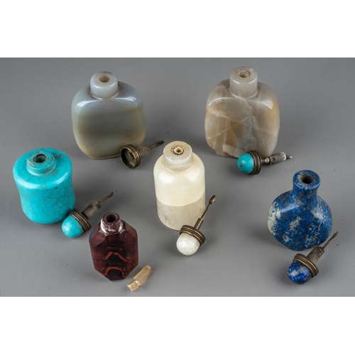 533 - A collection of Chinese hardstone snuff bottles, including lapis lazuli, reconstituted turquoise, et... 