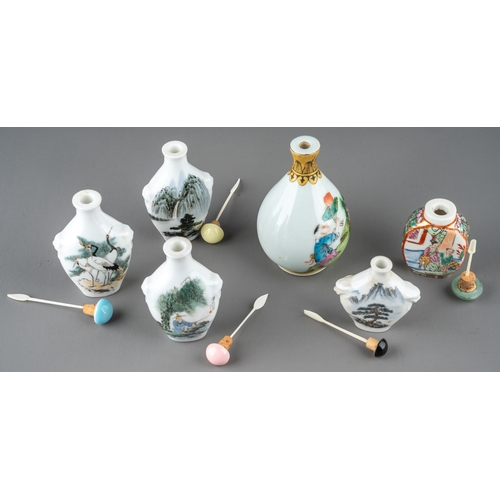 537 - A collection of Chinese porcelain snuff bottles, including three bottles decorated with cranes, land... 