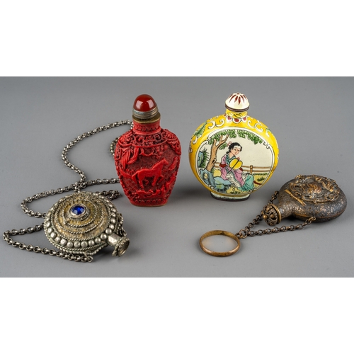 539 - A collection of Chinese snuff bottles, including an ovoid cinnabar bottle depicting horses amongst p... 