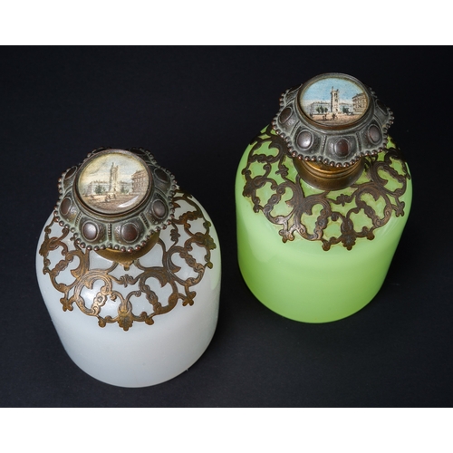 551 - A pair of 19th century continental glass scent bottles, one green uranium and one white, each having... 